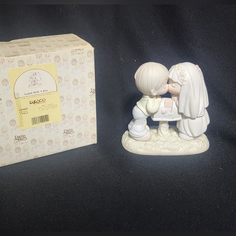 Sealed with a Kiss Precious Moment Figurine